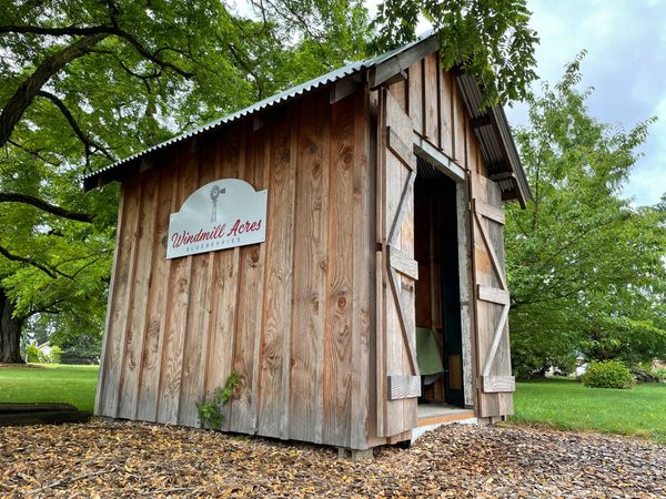 Rustic farm stand building at Windmill Acres